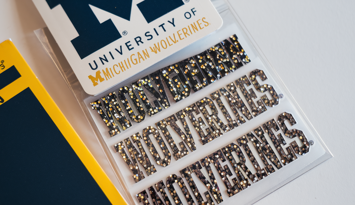 EyeBlack University of Michigan Wolverines Glitter Decal Under Eye Black Perfect for Tailgates, Game Days and Cheering Sport Team – 3 Pairs / 6 Decals